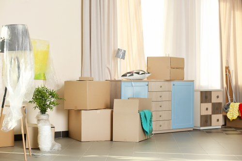 Removal team loading furniture for a home move in Cowley