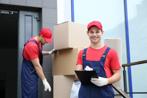 Man And Van Cowley van loading reusable items for recycling and donation