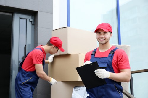 Removal van and moving boxes ready for house removals in Cowley
