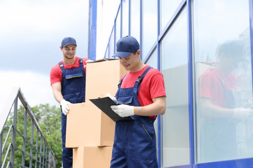 Packed moving boxes and furniture protection for a home move in Cowley
