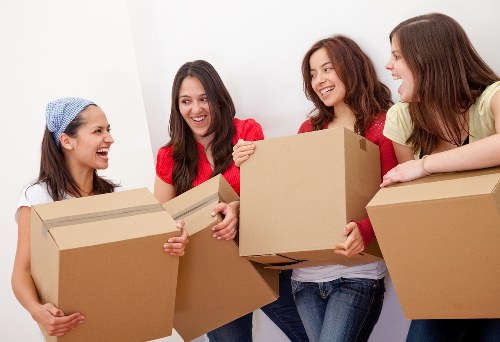 Mover checking and securing packed items before loading