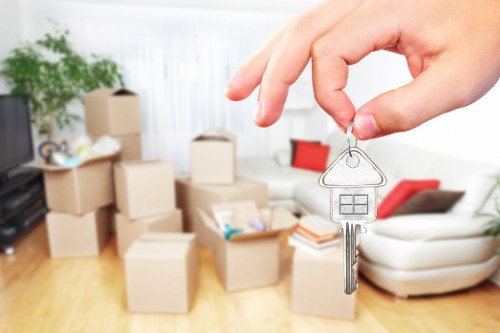 Packed household items ready for transport by removal van in Cowley