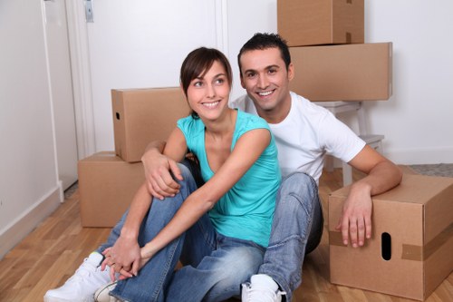 Professional movers loading furniture for same day removals in Cowley