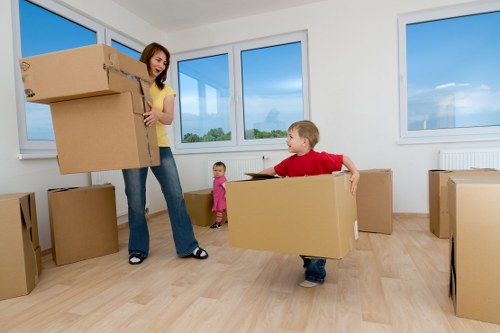 Experienced movers handling sofas and tables in Cowley