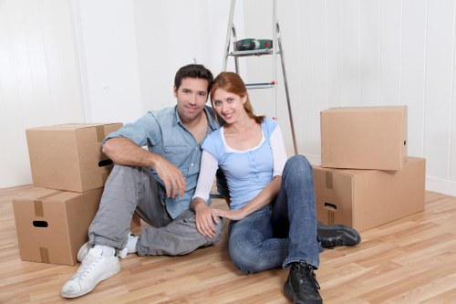 Local removal team handling furniture during a Cowley flat relocation