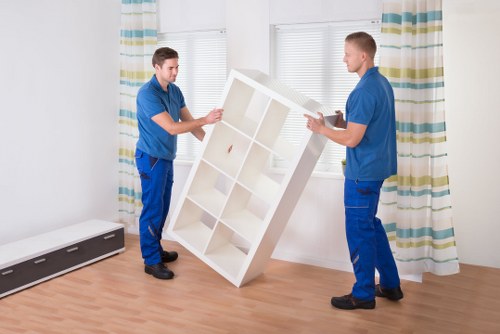 Office relocation preparation with labelled boxes and packed technology