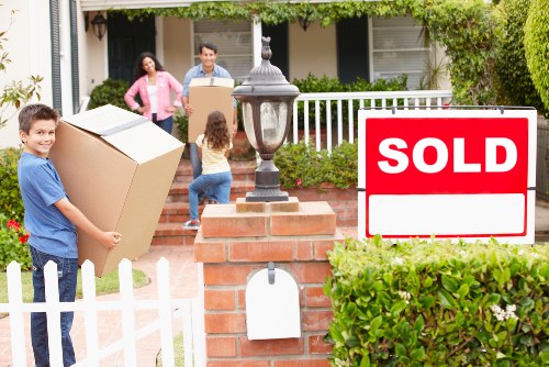 Careful labeling and box organization during packing services in Cowley