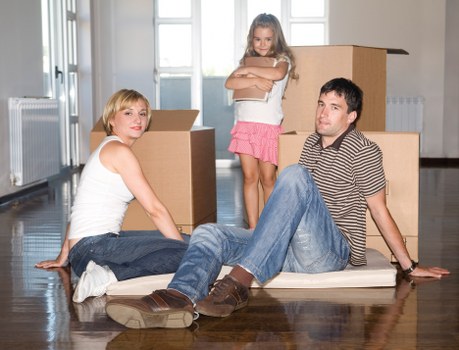 Driver handling furniture during transport